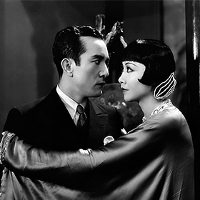 A still of an embracing couple from the film 'Daughter of the Dragon'