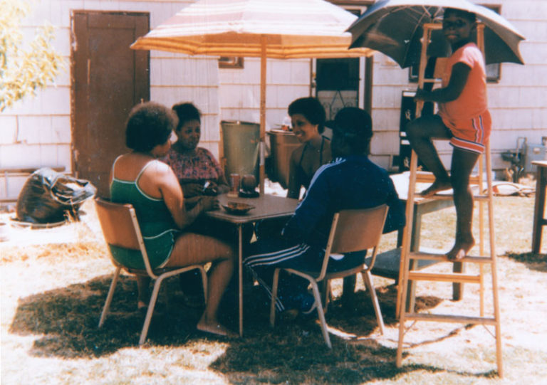 urcey, Oni, Dutch, Al, and young friend at a Fourth of July backyard barbecue.