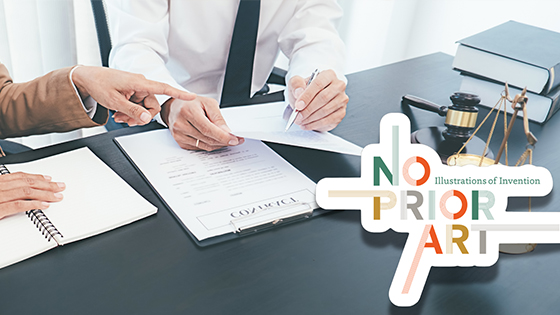 Legal documents being reviewed by two individuals