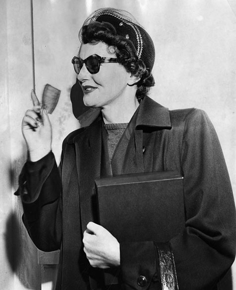 July 11, 1951 Brenda Allen kisses her County Jail property slip good-bye