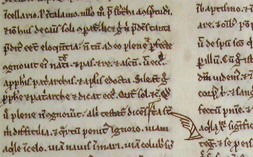 Medieval Manuscript passage with a manicule (pointing finger)