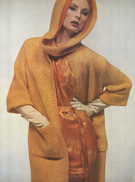 women wearing a hooded orange sweater
