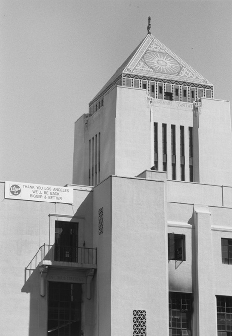 A sign on the shuttered Central Library expresses thanks for community support