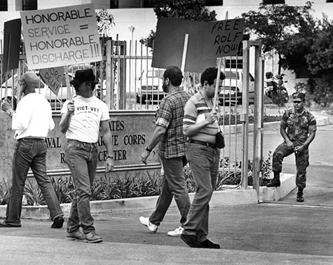 Protesters march outside the Marine Corps Reserve Center in Los Angeles