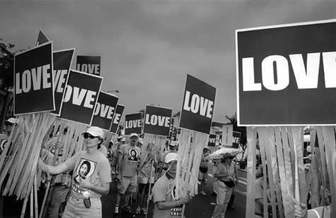 Episcopalians quietly carrying love signs at the 34th Annual Gay, Lesbian, Transgender, and Bisexual Pride Parade