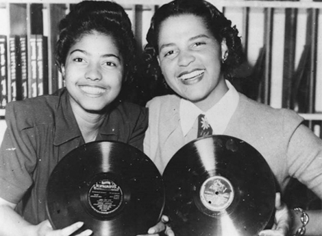 2 women in a record store