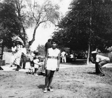 A girl enjoys Val Verde Park, also known as The Black Palm Springs