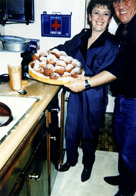 Sorrina and Marcel Yitzak prepare for a Hanukkah party