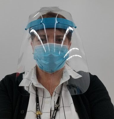 woman wearing a face shield