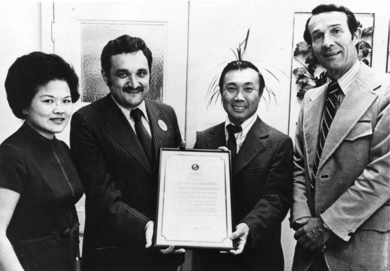 Dr. Chun-Hoon receiving an award for service as first Chinese American principal of a Los Angeles School District school
