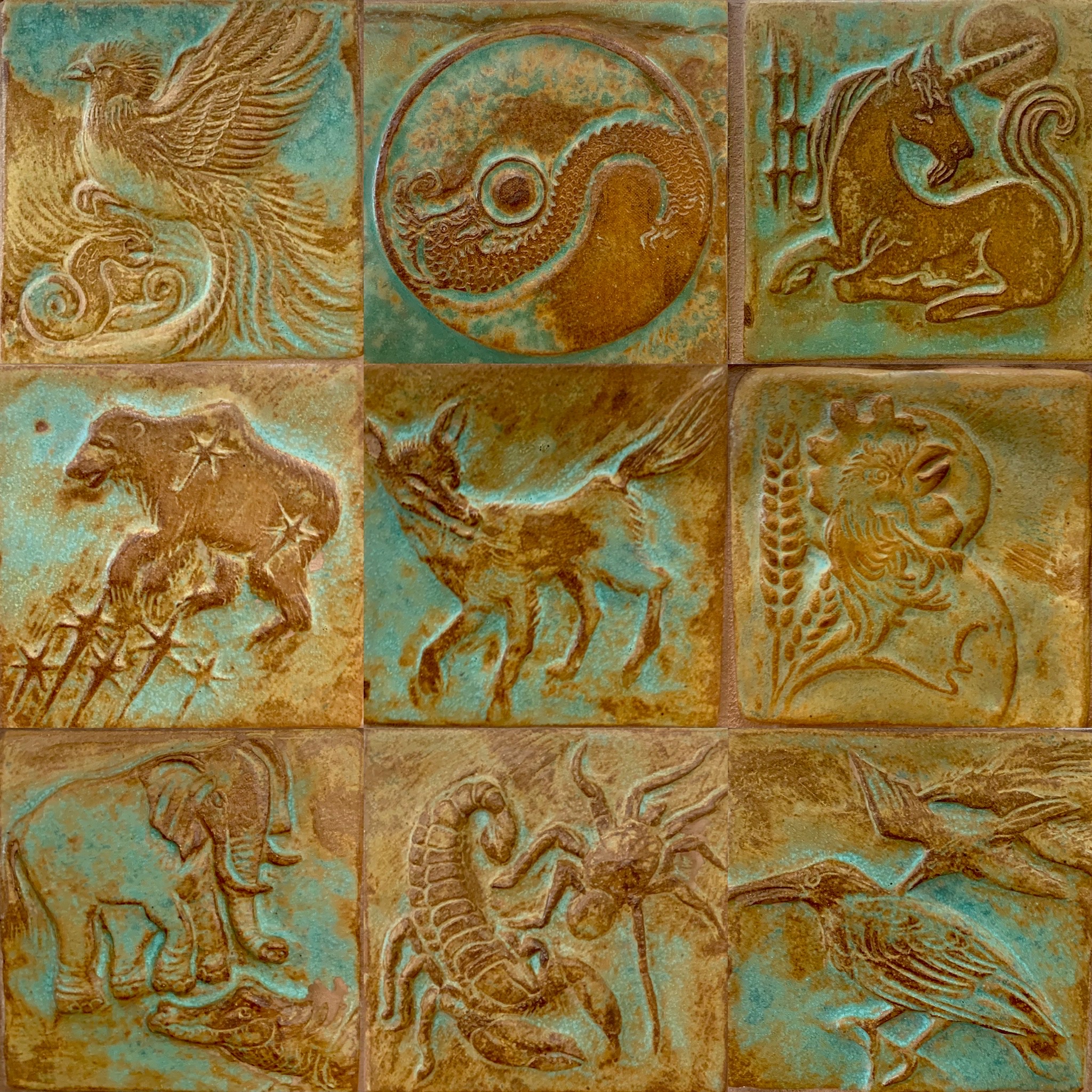 Cha-Rie Tang, hand-made, hand-carved, glazed ceramic tiles installed around the Children’s Reading Area