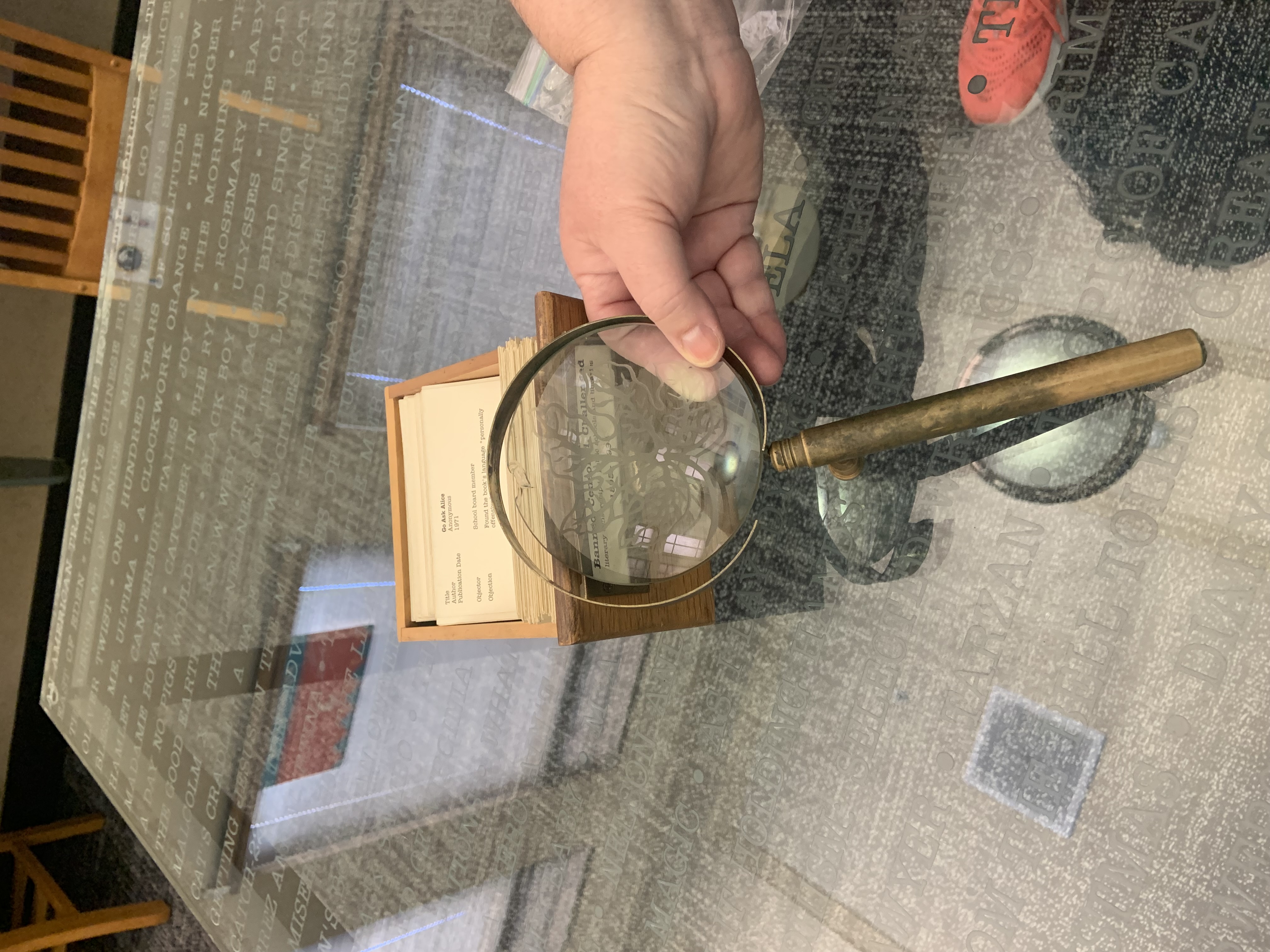 Nobuho Nagasawa table with a magnefying glass