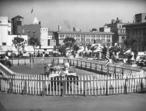 Children ride ponies on the roof of the May Company building in downtown Los Angeles