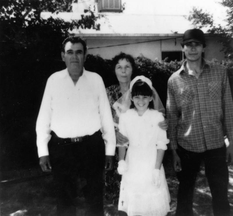 Richard Ramirez with his parents and niece in front of their El Paso home