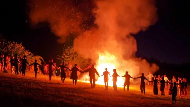 Neopagans around a bonfire at Samhain, October 31, 2021