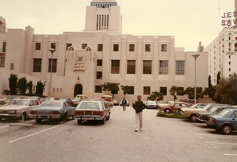 glen creason in front of central library