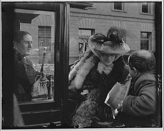 Ashton Stevens (left) and Sarah Bernhardt speaking to an unidentified man