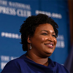 Voting rights activist Stacey Abrams speaking at an event.